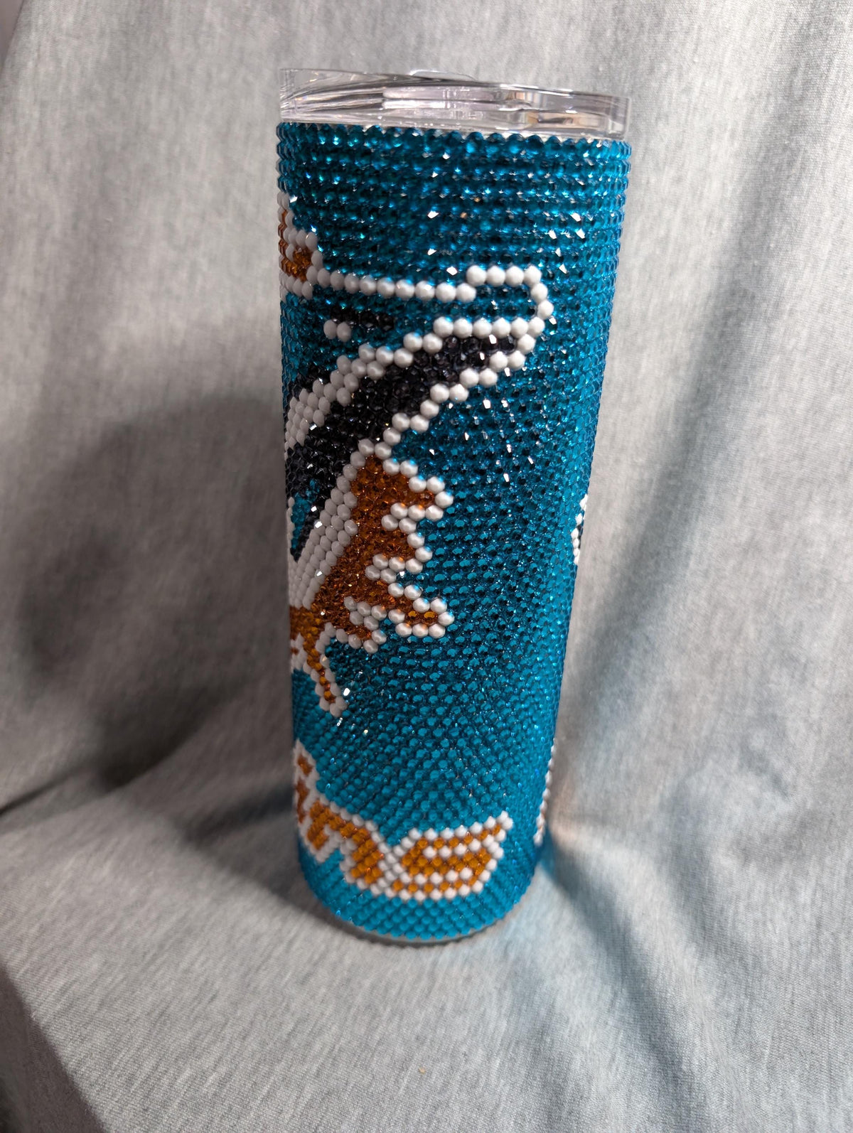 Dolphins football tumbler