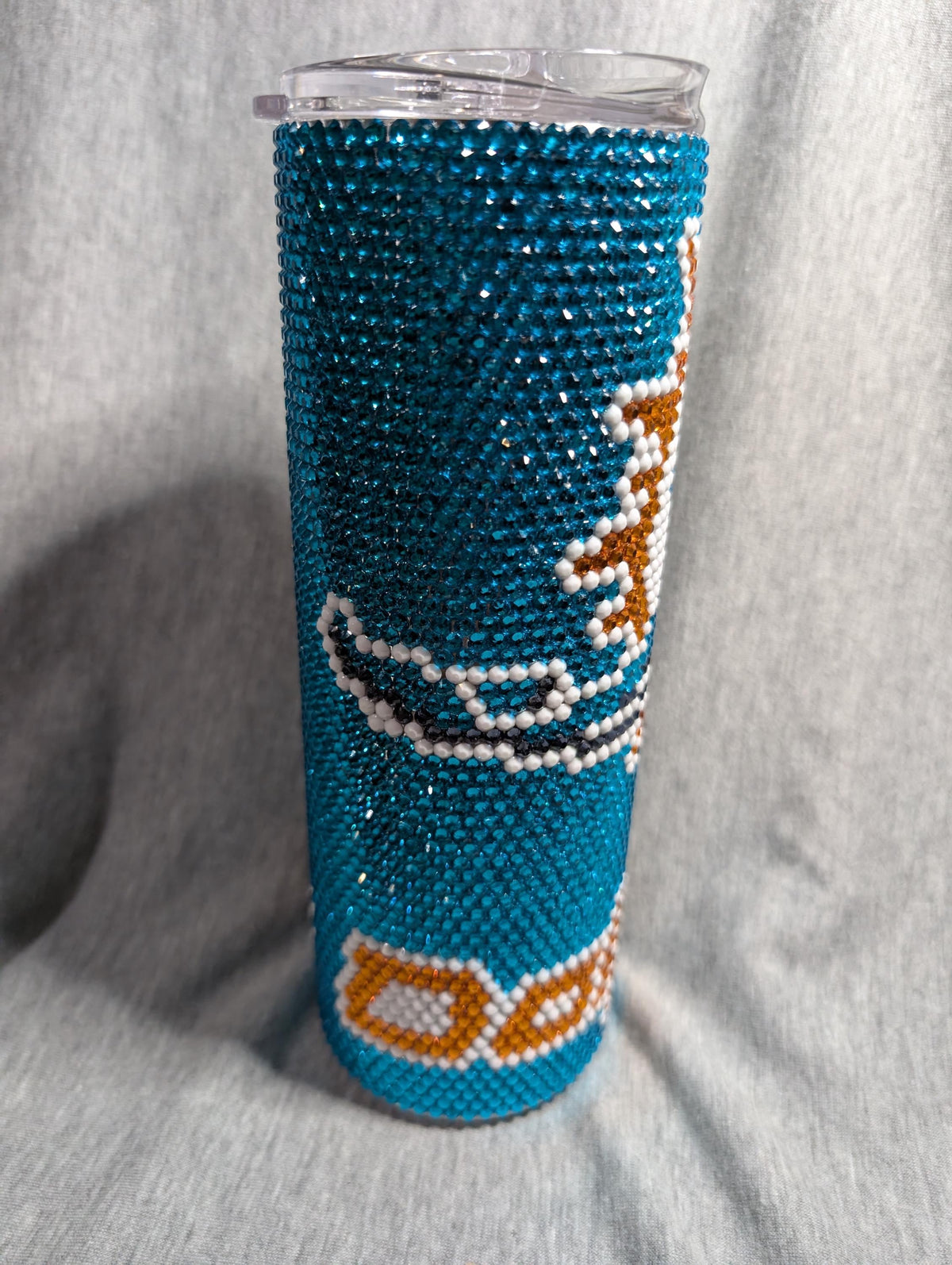 Dolphins football tumbler
