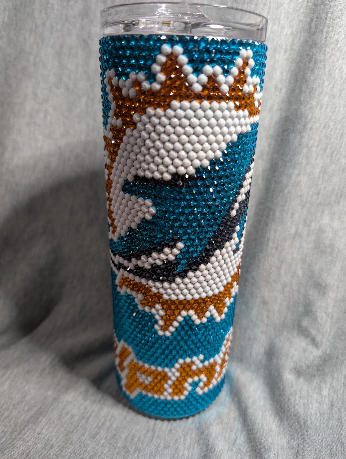 Dolphins football tumbler